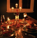 candlelight-dinner-table-glass-of-wine-1368707